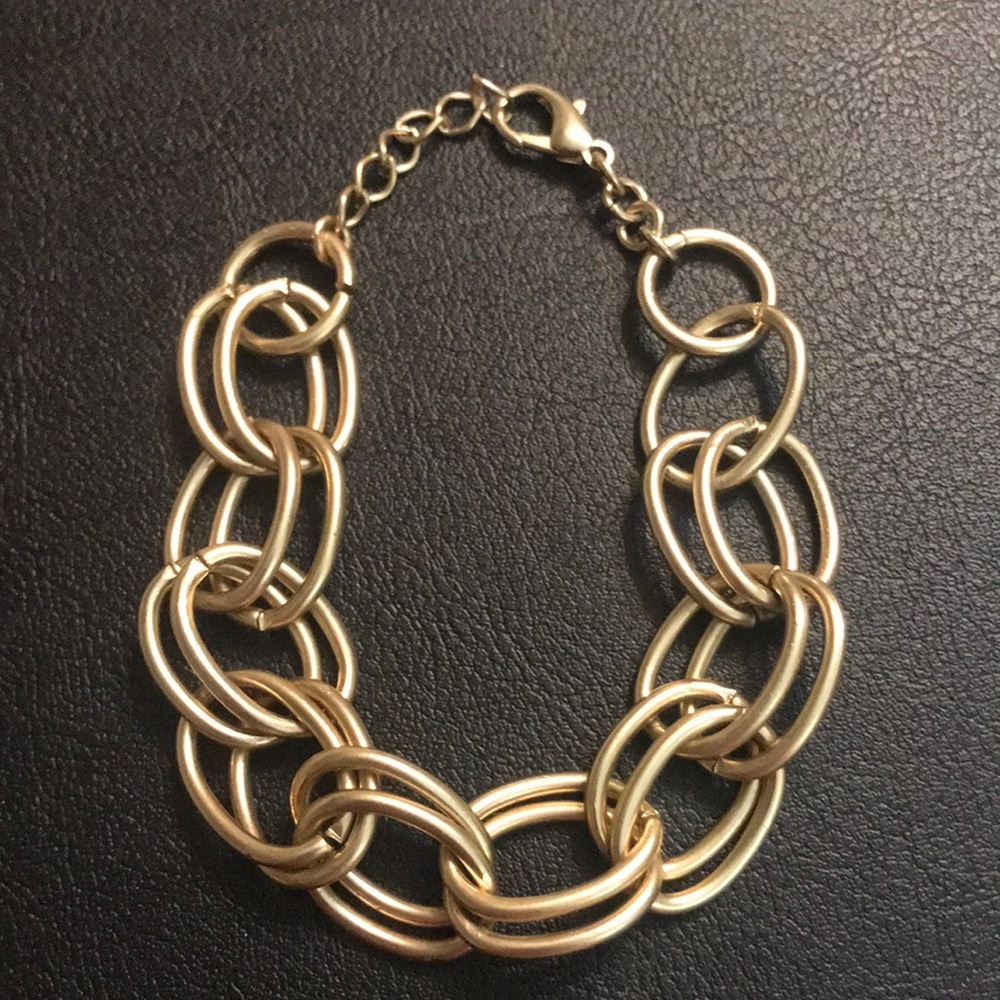 Brushed gold metal bracelet linked loops